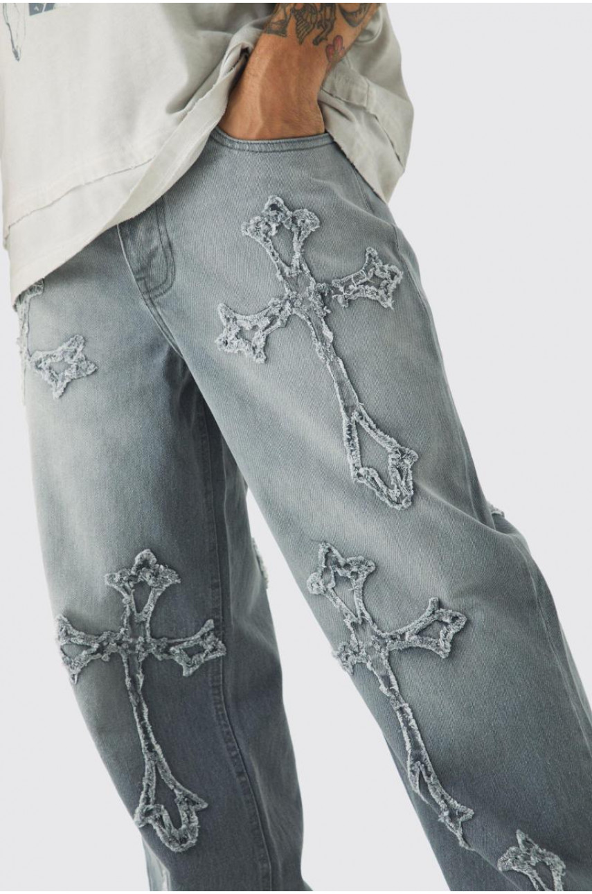Мішкуваті світло-сірі джинси з жорсткою хрестовою аплікацією