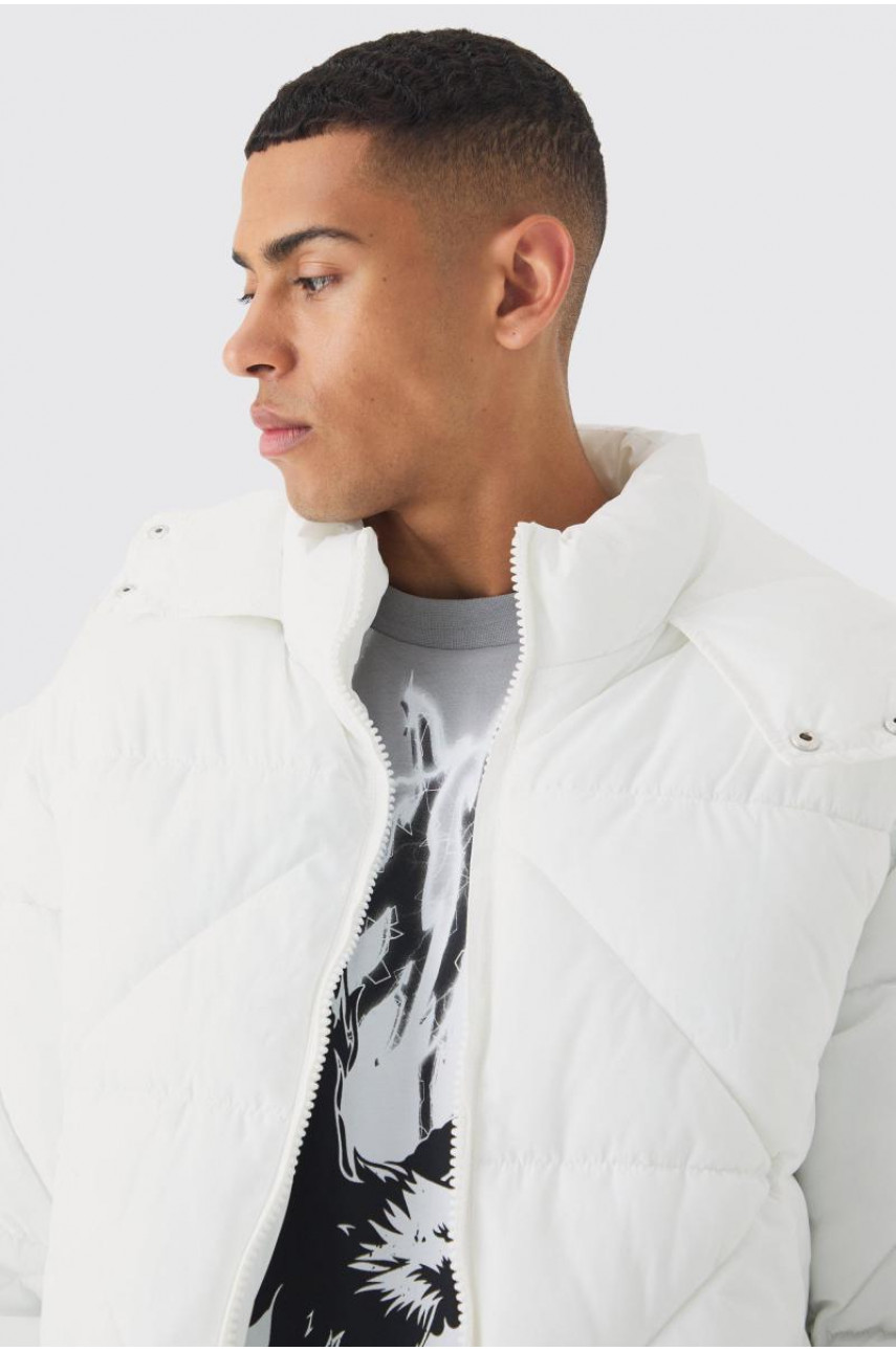 Абстрактний стьобаний пуховик білого кольору