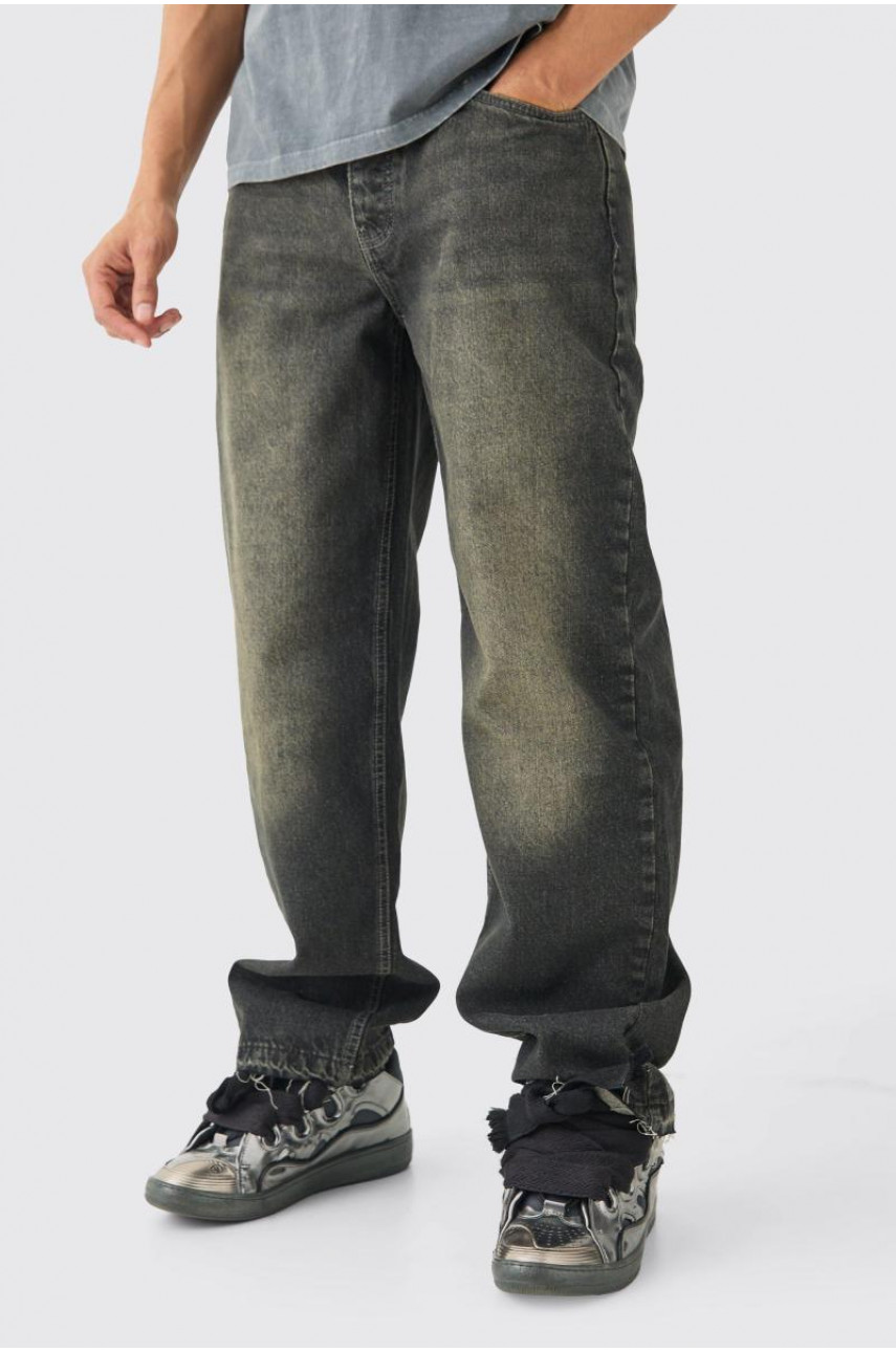 Мішкуваті сірі жорсткі джинси зі спущеним краєм