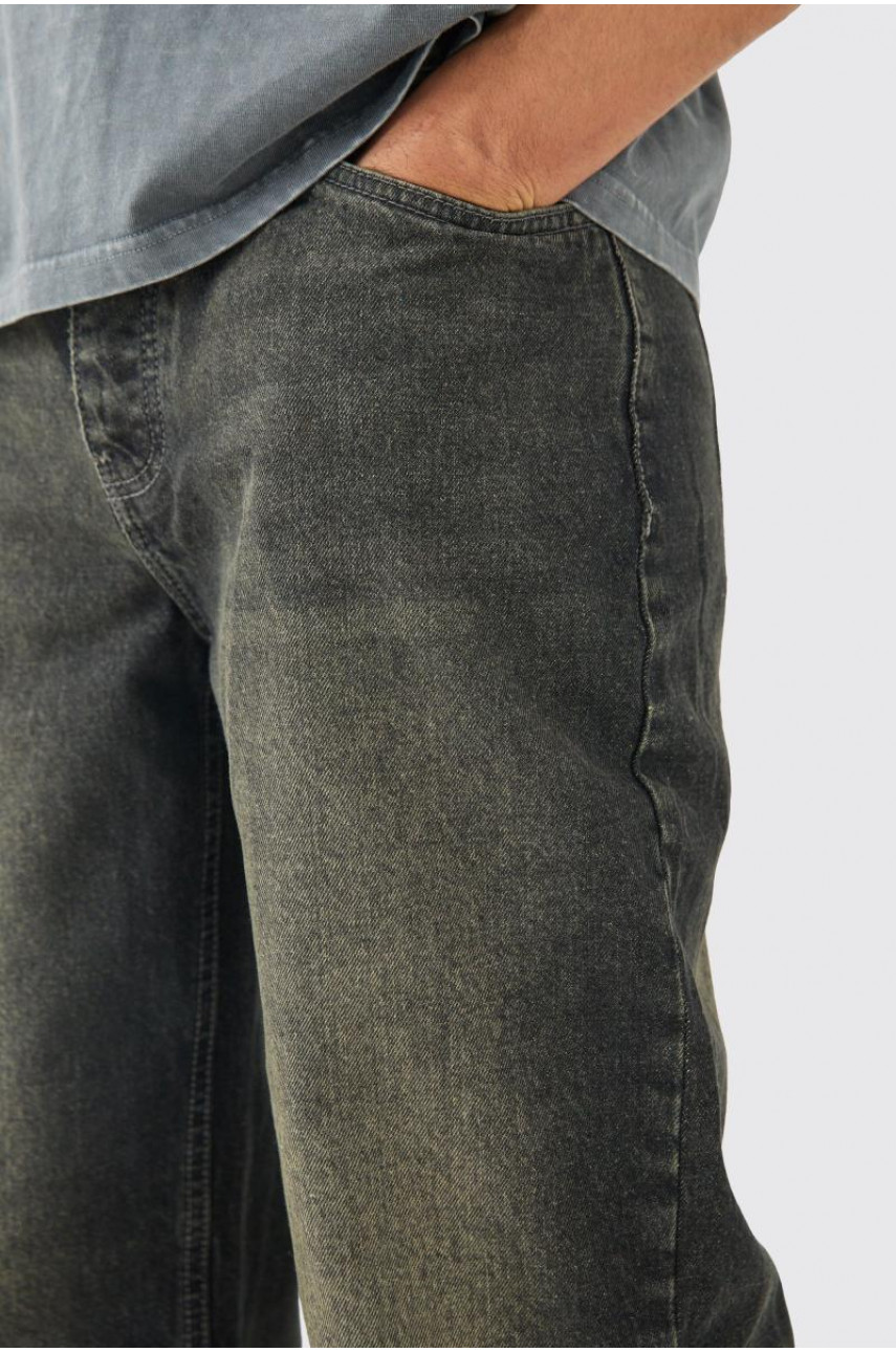 Мішкуваті сірі жорсткі джинси зі спущеним краєм