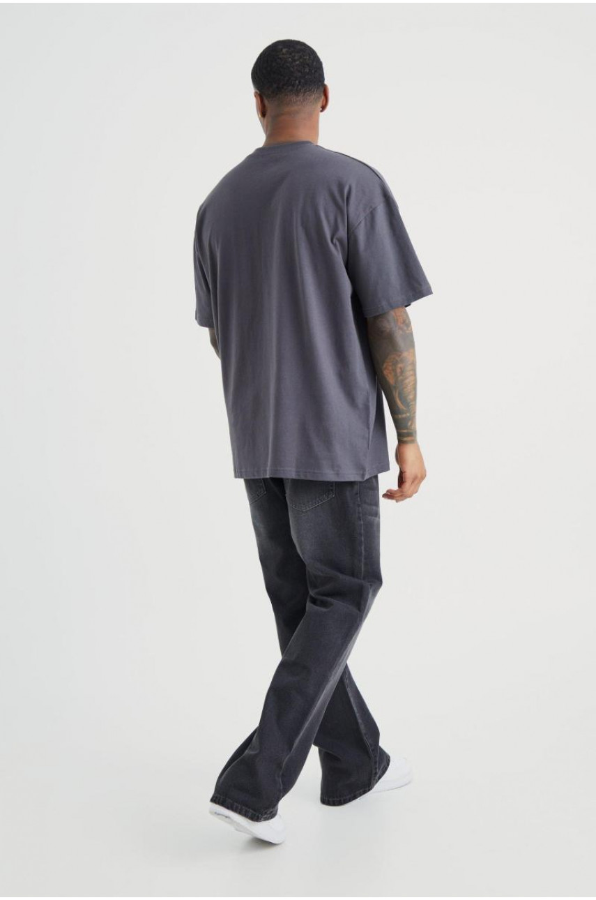 Розслаблені жорсткі джинси з кльошем