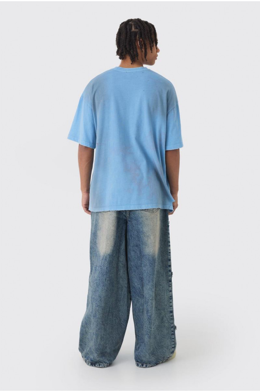 Широкі жорсткі зірчасті джинси з аплікаціями