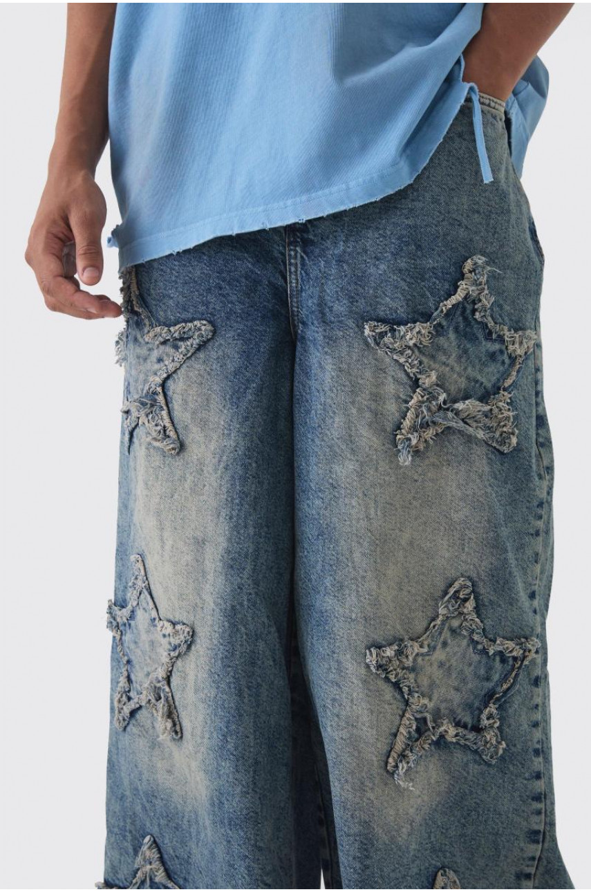 Широкі жорсткі зірчасті джинси з аплікаціями