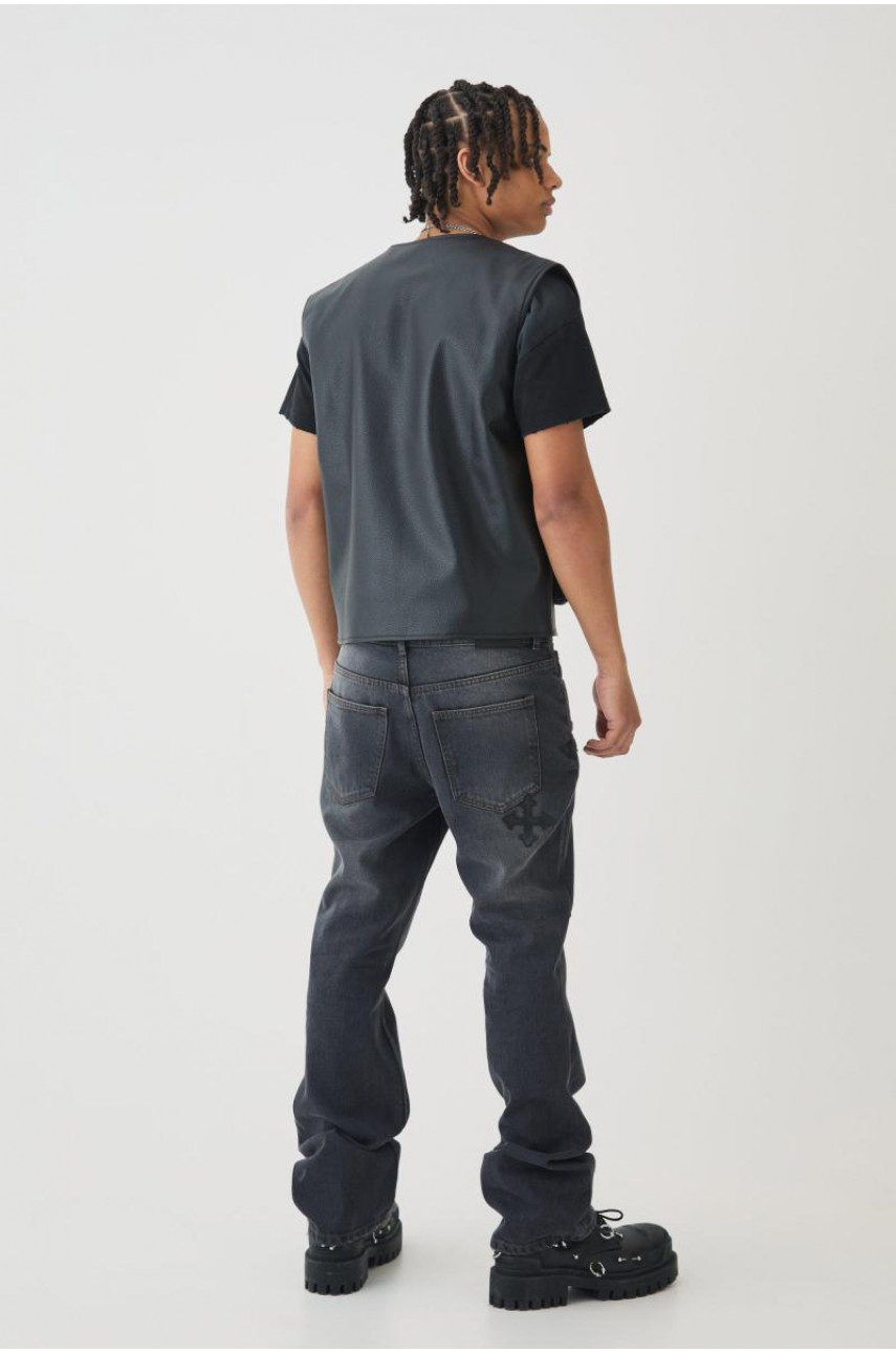 Вузькі жорсткі кльошові джинси з вишивкою хрестом