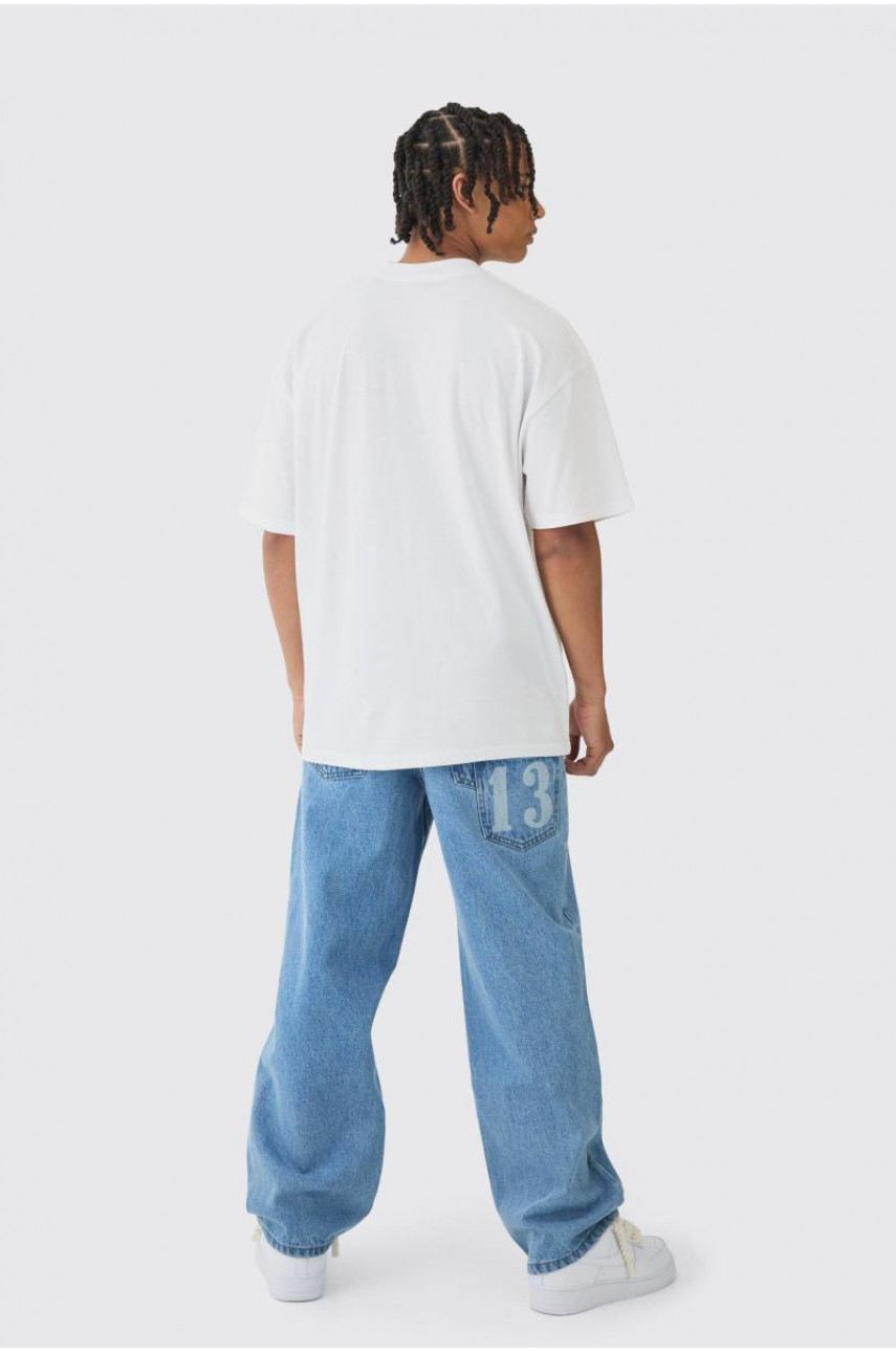 Мішкуваті жорсткі джинси Homme з лазерним принтом