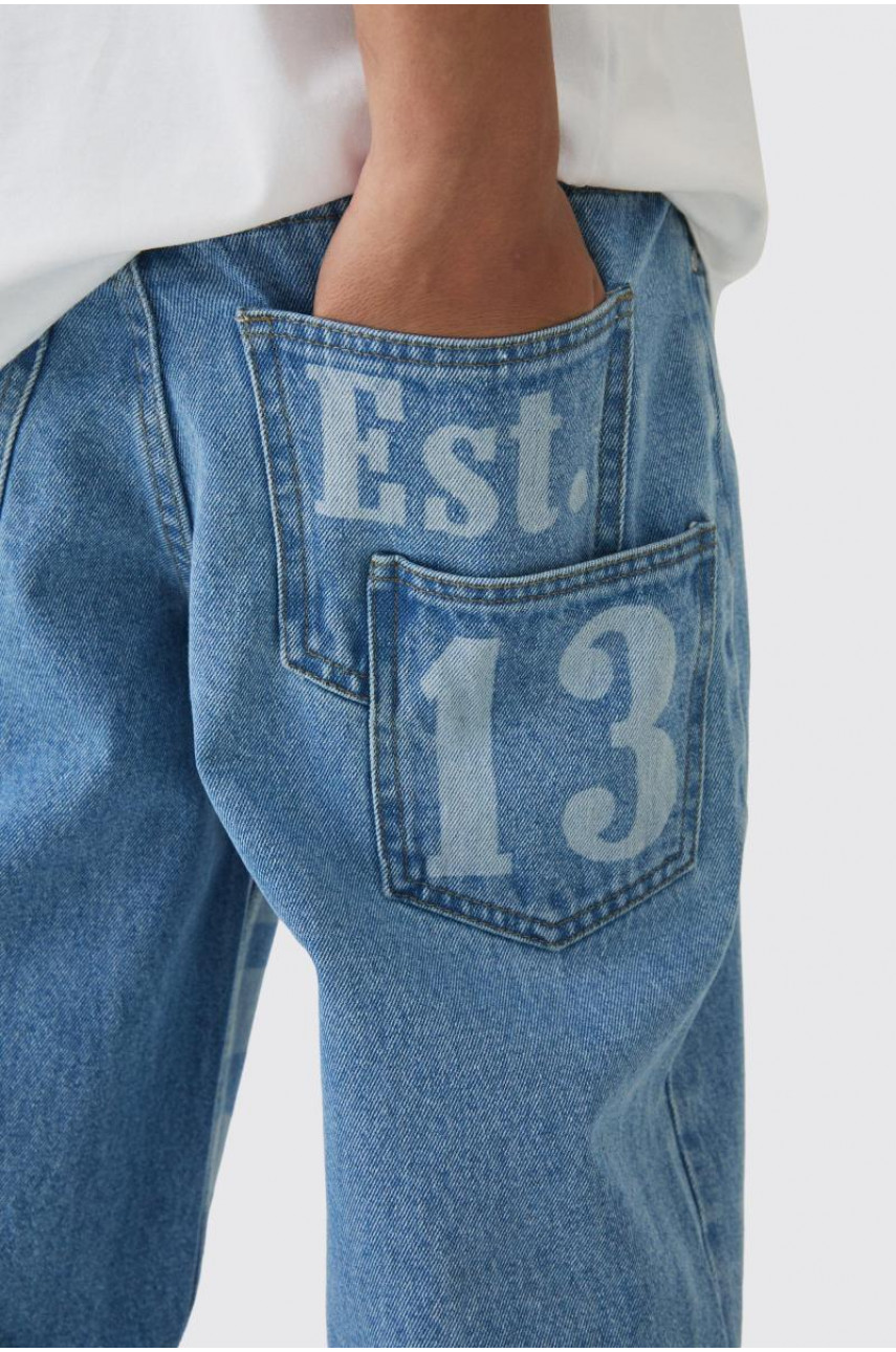 Мішкуваті жорсткі джинси Homme з лазерним принтом