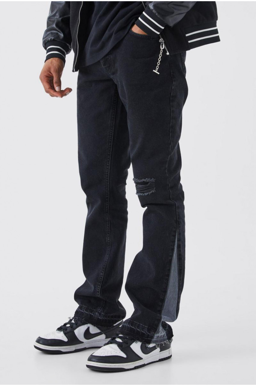 Тонкі жорсткі розкльошені контрастні рвані джинси з ластовицею